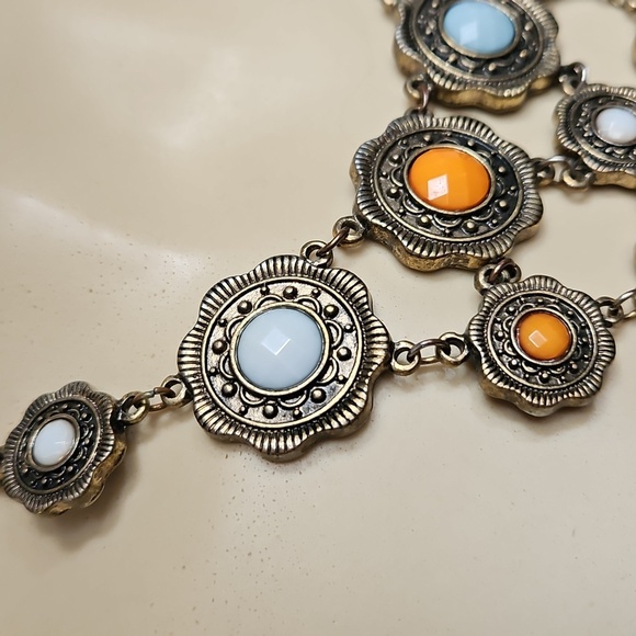 STATEMENT BIB STYLE NECKLACE WITH ORANGE,BLUE,AND WHITE STONES - Picture 3 of 8